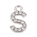 Detailed macro view of silver alloy S-letter pendant with sparkling pavé rhinestones - S