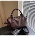 Deep brown lychee grain leather Boston bag with handles and adjustable shoulder strap - Brown