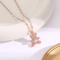 Detail of rose gold bear pendant with micro-paved zircons and heart hollow on water wave chain - Rose Gold Full Zircon Bear