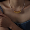 Gold curved crescent pendant on silver snake chain necklace worn by a model - Silver Chain with Gold Pendant-40cm / Gold and Silver