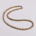 Close-up of gold and silver two-tone Byzantine chain necklace with intricate weaving - Two-tone (Gold & Silver)