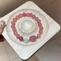 Macro detail of moonstone and pink quartz beads with gold spacers on wooden tray - Bracelet 35#