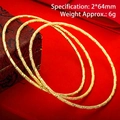 Set of 3 gold finish thin bangles with engraved patterns and a red jewelry box - 64mm / Style 1