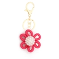 Pink crocheted daisy flower keychain with white faux pearl and golden metal clasp - Style 7 Red