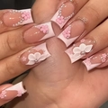 Detail of long square press-on nails with 3D floral art and pearl accents - Nude Pink French 3D Embossed Flower Pearl Style (BW125)