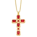 Close-up of golden cross necklace with red stones and micro-pave crystals on white background - Red