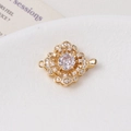 Macro shot of gold-plated flower clasp with micro-set zircon and pearl toggle detail - Camellia / Single Row / White