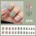 Short square press-on nails with green avocado finish and daisy floral pattern - A848 (Glue Type)