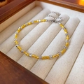 Primo piano del bracciale bicolore in oro 18 carati e argento in scatola di velluto - Bracciale Bicolore Oro-Argento