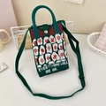 Close-up of green knit crossbody bag with Mahjong motifs and metal buckle closure - 20-Green White Red-Zhong