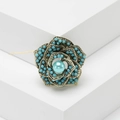 Broche de flor turca vintage con cuentas turquesas sobre fondo geométrico blanco puro - Azul Turquesa