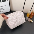 Quilted cotton cosmetic bag with white floral pattern and pink small flower details - Pink Floral
