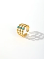 Detail of gold beaded band ring featuring three circular turquoise stones on white background - Triple Band Turquoise Gold (Style 2)