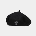 Detailed close-up of white palm tree embroidery on a black wool beret hat for women - Black