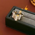 Macro shot of silver geometric ring with white shell inlay and pavé zircon on black velvet - Silver (Real Gold Plated)
