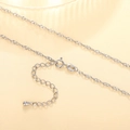 Macro view of silver water wave chain necklace with spring clasp and adjustable links - XL1189 Water Wave Chain