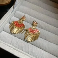 Detail of fan-shaped tassel earrings with red enamel and rhinestones in a gift box - Red Fan Tassel Style (HE29085)