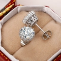 Classic silver crown stud earrings with sparkling round cubic zirconia in a jewelry box - E2121 14-Claw