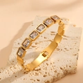 Titanium steel gold-plated bangle with rectangular crystals and a folding clasp - Square White Zirconia Style (R808) / Gold