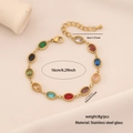 Macro detail of multi-colored oval glass gemstone bracelet with adjustable gold chain - Egg Shape