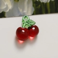 Detailed view of crystal cherry pendants with green leaves for DIY jewelry making - Dark Red (Single)
