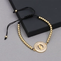 Bracelet ajustable en perles dorées avec pendentif Vierge Marie et zircons brillants - Chaîne Perles Noires Vierge Marie
