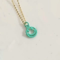 Minimalist gold chain necklace featuring a turquoise smiley face pendant with drip oil finish - Green