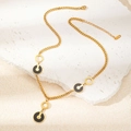 Goldene Edelstahlkette mit schwarzen Emaille-Anhängern und einer feinen Gliederkette - Schwarze Muschel Drei Scheiben Halskette