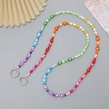 Regenbogen Perlenkette fürs Handy mit bunten Schmetterlingen und Sternen zum Umhängen - Crossbody-Kette / Bunter Perlenstil