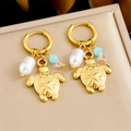 Macro detail of gold turtle pendant earrings with pearl and colorful faceted beads - Turtle Style (E6238)
