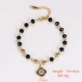 Detail of beaded bracelet with black flower pendant and technical dimension markings - Style 6 (Flower Charm)