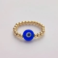 Detailed view of handmade 18K gold-plated beads with a blue glass Evil Eye charm ring - Size 7 (Elastic) / Dark Blue