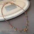 Tiger eye beaded necklace with dragonfly and star pendants in mixed colors, 41cm length - Rhodochrosite Dragonfly Necklace XL0703