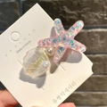 Pink translucent starfish hair clip with iridescent sequins and pearl details - Curved Shell Starfish / Pink