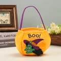 Halloween plush orange candy bag with Boo embroidery and green witch face detail - BOO Letter