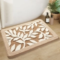 Beige plush bathroom mat with white leaf pattern on wooden floor next to a white bathtub - 40*60cm / Deep Forest Leaves
