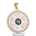 Macro detail of gold-plated evil eye charm with enamel white base and cubic zirconia - Style 14