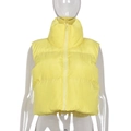 Detail view of yellow quilted vest featuring a protective stand collar and front zipper - M / Yellow