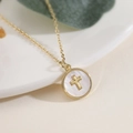18K gold plated necklace with a round shell pendant featuring a central gold cross - Cross Style (24712)
