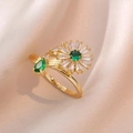 Golden sunflower ring with emerald green zircon center and white petal gemstones - Sunflower Ring (J0230)