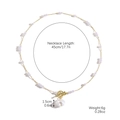 Baroque pearl necklace with gold OT buckle and a large round pearl pendant on white background - Gold Spaced Pearl OT Clasp Necklace