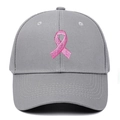 Detailed close-up of pink ribbon embroidery on a grey structured cotton baseball cap - Adjustable / Gray