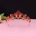 Detailed macro of vintage baroque gold crown with inlaid red rhinestones for wedding - No.2 KC Gold (Red Stone)