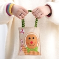 Sacchetto regalo di Natale in juta con ricamo omino di pan di zenzero e manici - Omino di pan di zenzero