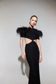 Detail of elegant black off-shoulder dress featuring premium feather trim and waist cutout - M / Black