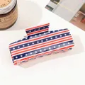Detail of a large shark hair clip with American flag pattern on a minimalist background - Stars Stripes Flag Clip - 10.5cm Solid Square