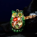 Green crystal owl keychain pendant with sparkling rhinestones on dark stone background - A430 Owl R Green