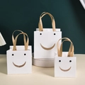White smiley gift bags with kraft handles in three sizes for creative gift packaging - XL: 20*20*20cm / White Smiley Face