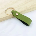 Minimalist green PU leather keychain with gold metal ring and rivet detail for bags - No.8 Grass Green