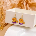 Cartoon pumpkin earrings with purple dress design for Halloween costume jewelry - Pumpkin Man